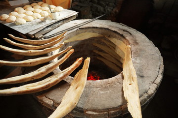 Homemade brad on a national oven tandoor.