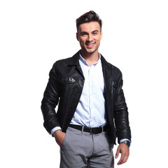 portrait of relaxed businessman in leather jacket standing