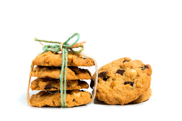 A stack of chocolate chip cookies isolated on a white background