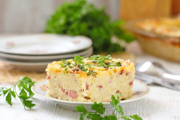 Homemade pasta baked with ham and cheese