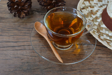 Hot tea glass on For a cold winter wooden background