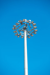 Stadium light on blue sky