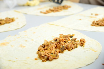 Fried meat for shawarma in pita bread