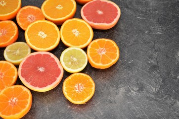 orange lemon fruits slices on kitchen table