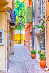 Fototapeta na wymiar Tranquil and Empty Street of Chania at Summer Time in Crete, Greece