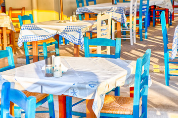 Sunny Open Air Restaurant in Chania City on Crete. Decorated wirh Classic Greek Blue and White Colors.