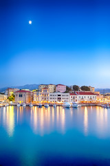 Travel Concepts. Picturesque Image of Old Venetian Harbour of Chania with line of Fisihing Boats...