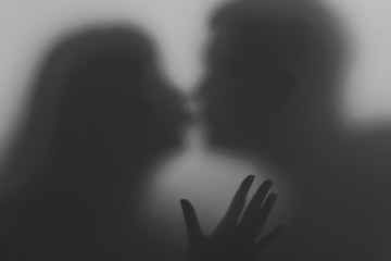 Silhouettes of lovers. Kiss two lovers. Silhouettes of two people in love. 