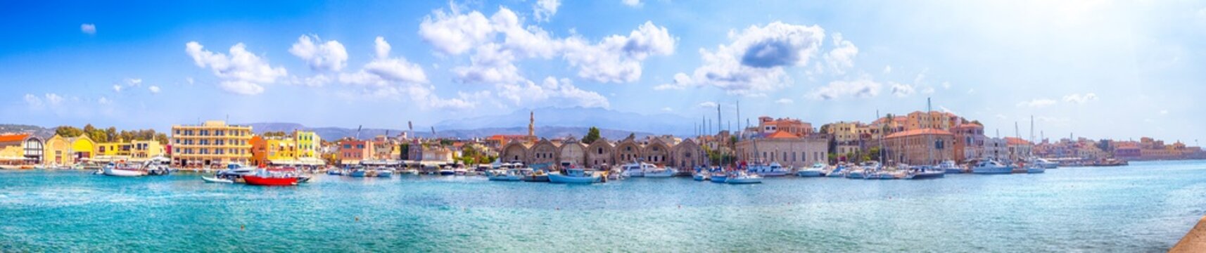 Travel Concepts and ideas. Panoramic Image of Chania Old City and Ancient Venetian Port Taken From Lighthouse Pier in Crete, Greece.