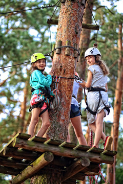 two girls on a rope park