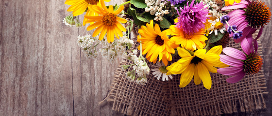 Bouquet of wild flowers vintage board