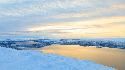 Lake Kilpisjärvi, Finnland at sunrise in winter wonderland, view from Mountain Saana