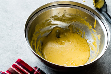 Preparing Hollandaise Sauce in Pot / French Cooking Recipe
