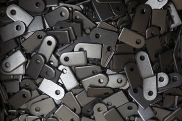 Steel plate cut out according to pattern, background image. Manufacturing process - steel cutting...