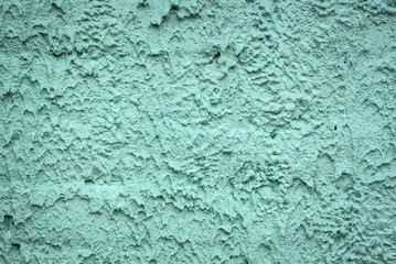 Green plaster wall