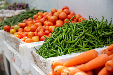Group of fresh tomatoes organic vegetables background in market