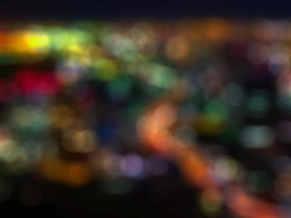 blurred city night life bokeh light background.