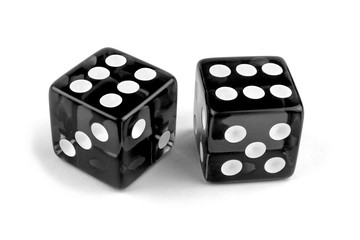 Two black glass dice isolated on white background. Six and six.