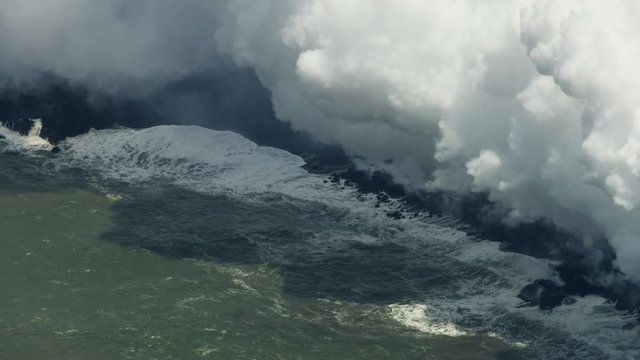 Aerial view Kilauea volcanic lava entering Pacific ocean