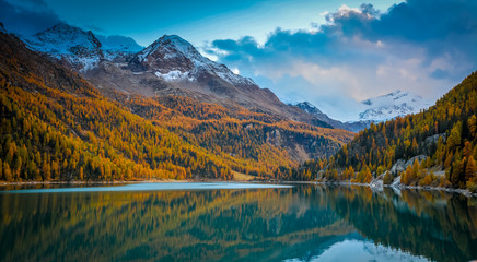 Lago di Gioveretto (Zufrittsee) during autumn, Martello Valley, Venosta Valley, province of Bolzano, South Tyrol, northern Italy, Europe.Beauty of nature concept background.