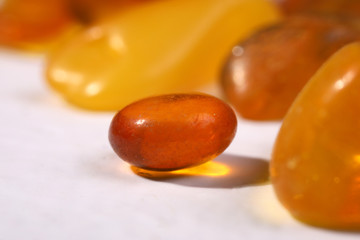 Baltic amber stones on white background