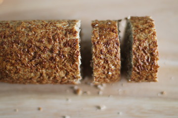 Sliced long bread on wooden desk