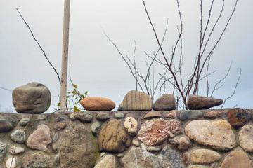 Obraz premium Rocks on the stone wall fence