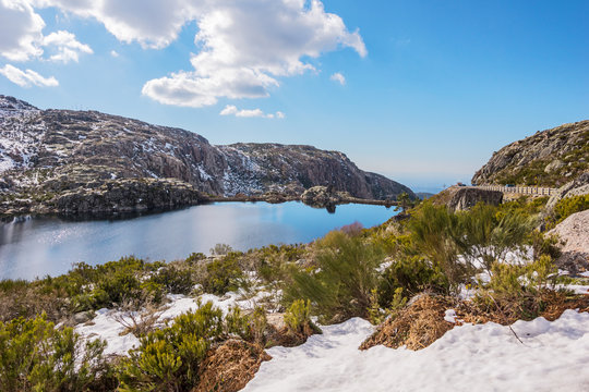 Snowy Mountains and Reservoir at Lagoa Comprida, a Lake In Serra da Estrela Natural Park in Central Portugal During Winter