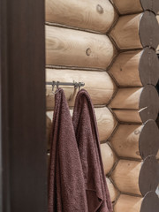 Obraz na płótnie Canvas spa towels on wooden surface. wood logs background.