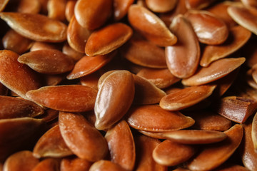 Flax seeds or linseeds. Extreme macro photography.