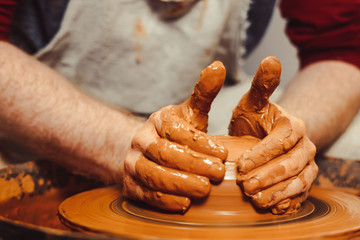 Potter makes a jug