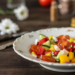 salad fresh vegetables (tomato, cucumber, radish, pepper, arugula and other vegetables). copy space. top