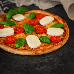 pizza vegetables and cheese (broccoli, mozzarella basil and others). food background
