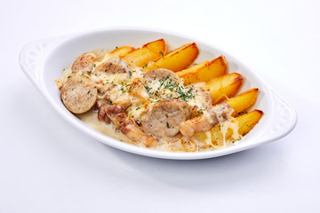 sausage with potatoes on the white background