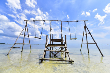 Swing located in Pantai Tanjung Kelayang Beach near the island of Belitung, Indonesia