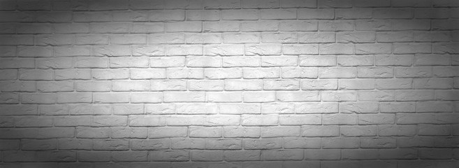 Black and white old brick wall, panoramic background. Office design, backdrop