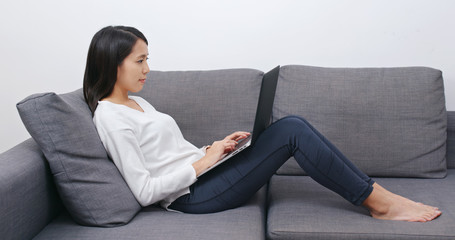 Woman work on laptop computer at home