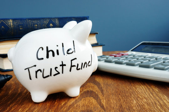 Child Trust Fund CTF Written On A Side Of Piggy Bank.