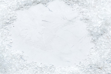 crashed ice cubes frame on marble bar table top view mock-up