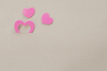 Pink heart shape on paper background