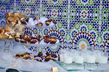 Dates and milk are of Moroccan customs in reception of guests. Presented at the wedding for the bride