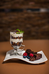 Rows of raw organic nuts and oatmeal for granola in box