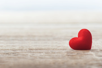 Fototapeta premium Red Heart on wooden backdrop. Happy valentines day. St. Valentine background. Holidays greeting card copy space 