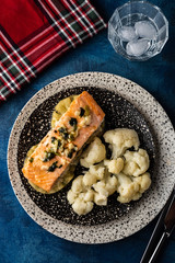 Solomon fillet with pineapple and cauliflower. Fish with vegetables.