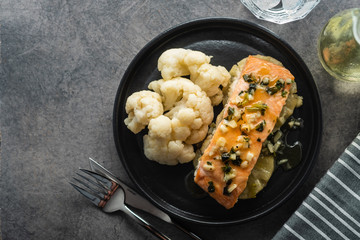Solomon fillet with pineapple and cauliflower. Fish with vegetables.