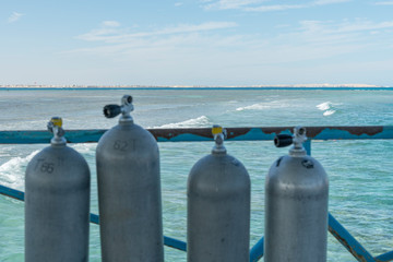 A lot of diving cylinders. oxygen cylinders outdoor. Oxygen cylinders for swimming in the...