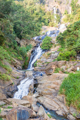 Fototapeta na wymiar Ravana Falls in a green forest near Ella in Sri Lanka.