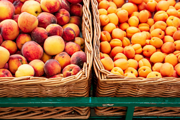 Backet with rope peaches and with plums