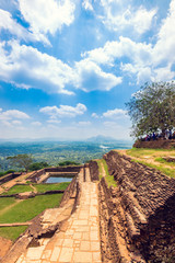 Sigiriya Rock or Lion Rock is an ancient fortress near Dambulla, Sri Lanka. Sigiriya is a UNESCO World Heritage Site.