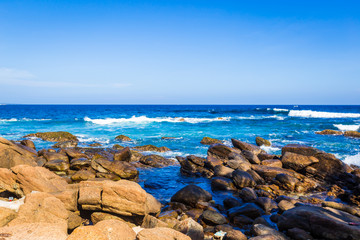 Ocean seaside of wild beautiful stone beach of Sri Lanka